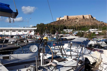Fishing boats in the harbour and the 6th century Byzantine Fortress in the background, Kelibia, Tunisia, North Africa, Africa Stock Photo - Rights-Managed, Code: 841-05794588