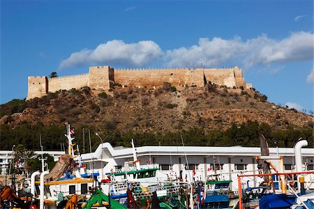 The 6th century Byzantine Fortress overlooking fishing boats in the harbour, Kelibia, Tunisia, North Africa, Africa Stock Photo - Rights-Managed, Code: 841-05794589