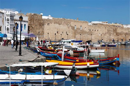 Old Port Canal, fishing boats and wall of the Kasbah, Bizerte, Tunisia, North Africa, Africa Stock Photo - Rights-Managed, Code: 841-05794580