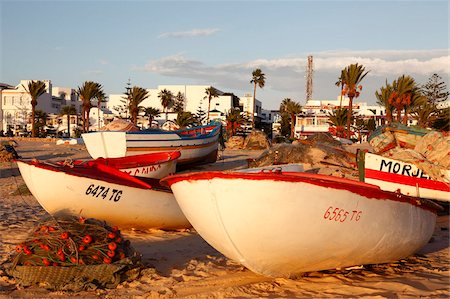 Fishing boats by the harbour, Hammamet, Tunisia, North Africa, Africa Foto de stock - Con derechos protegidos, Código: 841-05794601
