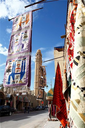 simsearch:841-03502480,k - Main street with mosque and carpet shop display, Tozeur, Tunisia, North Africa, Africa Stock Photo - Rights-Managed, Code: 841-05794623