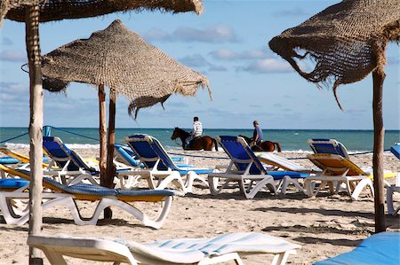 Scène de plage sur la côte méditerranéenne dans la zone, l'île de Djerba, en Tunisie, l'Afrique du Nord, Afrique de tourisme Photographie de stock - Rights-Managed, Code: 841-05794648