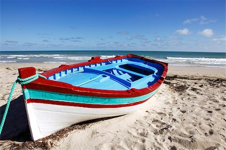Small boat on tourist beach the Mediterranean Sea, Djerba Island, Tunisia, North Africa, Africa Stock Photo - Rights-Managed, Code: 841-05794649