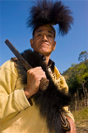 Traditionally dressed man with machete from the Hillmiri tribe, Arunachal Pradesh, Northeast India, India, Asia Stock Photo - Rights-Managed, Code: 841-05794887