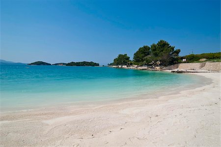White sand beach and turquoise water at Ksamil, Albania, Europe Foto de stock - Con derechos protegidos, Código: 841-05795016