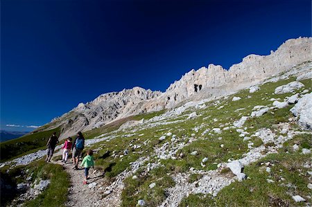 family child vacation italy - Hiking in the Latemar mountain range, Dolomites, eastern Alps, South Tyrol, Bolzano province, Italy, Europe Stock Photo - Rights-Managed, Code: 841-05795182