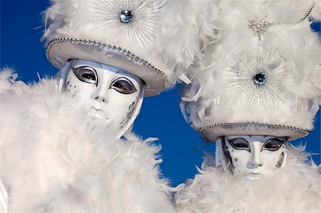 pluma - Masks at Venice Carnival in St. Mark's Square, Venice, Veneto, Italy, Europe Foto de stock - Direito Controlado, Número: 841-05795243