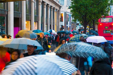 rainy street scene - Shoppers in the rain, Oxford Street, London, England, United Kingdom, Europe Stock Photo - Rights-Managed, Code: 841-05795584