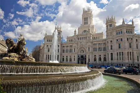 Cibeles sculpture and fountain, Main Post Office Building (Palacio de Communicaciones), in spring sunshine, Plaza Cibeles, Madrid, Spain, Europe Stock Photo - Rights-Managed, Code: 841-05795883