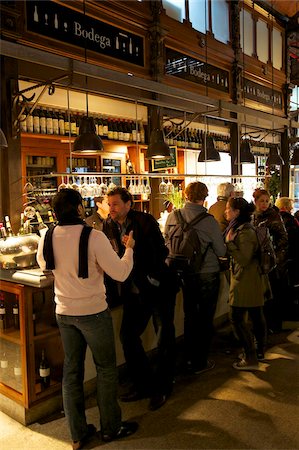 dining in spain - Spanish enjoy tapas and wine in indoor market, Mercado de San Miquel, Madrid, Spain, Europe Stock Photo - Rights-Managed, Code: 841-05795901