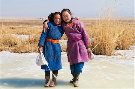 simsearch:841-05796497,k - Young Mongolian girls in traditional costume (deel), Province of Khovd, Mongolia, Central Asia, Asia Fotografie stock - Rights-Managed, Codice: 841-05796496