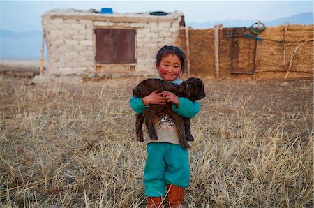 Young Mongolian nomad boy with his goat, Province of Khovd, Mongolia, Central Asia, Asia Stock Photo - Rights-Managed, Code: 841-05796499