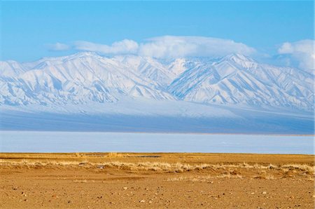 Winter landscape in Biosphere reserve with snow covered mountains, Lake Khar Us Nuur, Province of Khovd, Mongolia, Central Asia, Asia Stock Photo - Rights-Managed, Code: 841-05796502