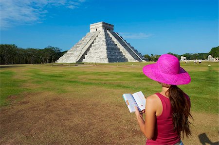 ruins people - Tourist looking at El Castillo pyramid (Temple of Kukulcan) in the ancient Mayan ruins of Chichen Itza, UNESCO World Heritage Site, Yucatan, Mexico, North America Stock Photo - Rights-Managed, Code: 841-05796597