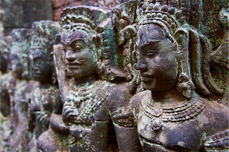 sculpture and close up - Relief sculpture of Apsara and divinity, Terrace of Leprous King, Angkor Thom, Angkor, UNESCO World Heritage Site, Siem Reap, Cambodia, Indochina, Southeast Asia, Asia Stock Photo - Rights-Managed, Code: 841-05796694