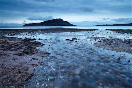 An October morning at Lamlash bay on the Isle of Arran looking across the sea to Holy Island, Scotland, United Kingdom, Europe Stock Photo - Rights-Managed, Code: 841-05796854