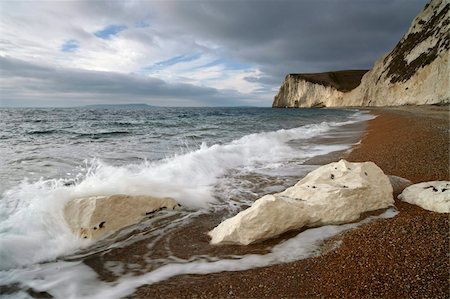 A view toward Bat Head and in the distance the Isle of Portland from beneath Swyre Head, Jurassic Coast, UNESCO World Heritage Site, Dorset, England, United Kingdom, Europe Stock Photo - Rights-Managed, Code: 841-05796978