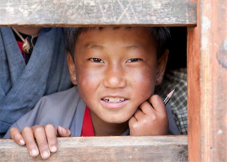 Young boy at his school in Ura Village, Ura Valley, Bumthang, Bhutan, Asia Foto de stock - Con derechos protegidos, Código: 841-05845861