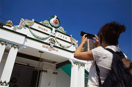 solo java indonesia - Woman taking photo of entrance of Kraton (Palace of Sultans), Yogyakarta, Java, Indonesia, Southeast Asia, Asia Stock Photo - Rights-Managed, Code: 841-05846517