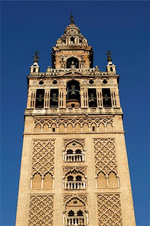 Giralda, the Seville cathedral bell tower, formerly a minaret, UNESCO World Heritage Site, Seville, Andalucia, Spain, Europe Stock Photo - Rights-Managed, Code: 841-05846972