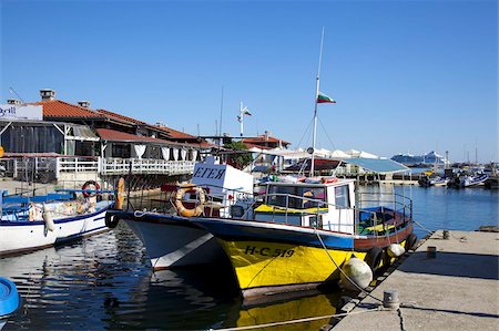 Boats and restaurants along the harbour quay, Nessebar, Black Sea, Bulgaria, Europe Stock Photo - Rights-Managed, Code: 841-05847099