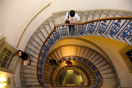 spiral staircase - Visitors on  circular stairway, Courtauld Galleries, Somerset House, London, England, United Kingdom, Europe Stock Photo - Rights-Managed, Code: 841-05847369