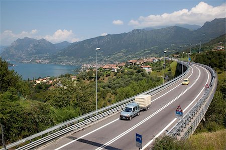 Lake and the S10 road, Lake Iseo, Lombardy, Italian Lakes, Italy, Europe Stock Photo - Rights-Managed, Code: 841-05848105