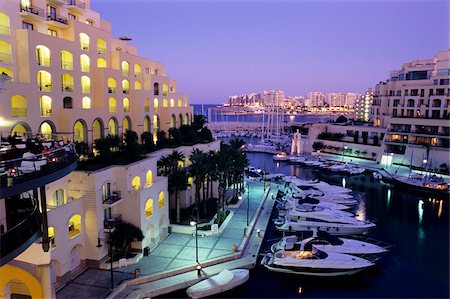 Portomaso Marina at dusk with Hilton Hotel, Paceville, St. Julian`s, Malta, Mediterranean, Europe Stock Photo - Rights-Managed, Code: 841-05848548