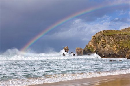 rainbow landscape not person - Éperons, arc en ciel, nuages orageuses et mer agitée sur un après-midi venteux Dalmore Bay sur l'île de Lewis, Hébrides extérieures en Écosse, Royaume-Uni, Europe Photographie de stock - Rights-Managed, Code: 841-05848780