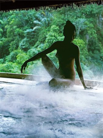 female sitting at edge of pool - Steambath, Bagus Jati Spa, Ubud, Indonesia, Southeast Asia, Asia Stock Photo - Rights-Managed, Code: 841-05959670
