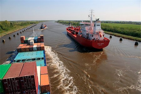 ship on horizon - Shipping near Brunsbuttel, Kiel Canal, Schleswig-Holstein, Germany, Europe Stock Photo - Rights-Managed, Code: 841-05960222