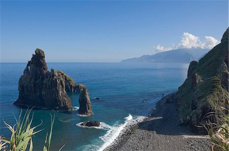 Rocky coastline with lava rock columns jutting out of the ocean, Northern Madeira, Portugal, Atlantic Ocean, Europe Stock Photo - Rights-Managed, Code: 841-05960822