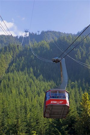 sunlight treetops - Skyride cable car up to the top of Grouse Mountain, Vancouver, British Columbia, Canada, North America Stock Photo - Rights-Managed, Code: 841-05961717