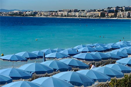 Beach umbrellas viewed from the Promenade des Anglais, Nice, Alpes Maritimes, Provence, Cote d'Azur, French Riviera, France, Mediterranean, Europe Stock Photo - Rights-Managed, Code: 841-05961895