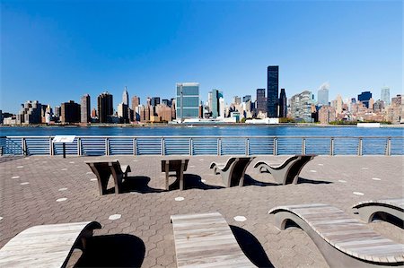 Skyline of Midtown Manhattan seen from the East River showing the Chrysler Building and the United Nations building, New York, United States of America, North America Stock Photo - Rights-Managed, Code: 841-05961935