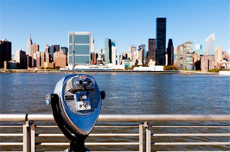 Skyline of Midtown Manhattan seen from the East River showing the Chrysler Building and the United Nations building, New York, United States of America, North America Stock Photo - Rights-Managed, Code: 841-05961936