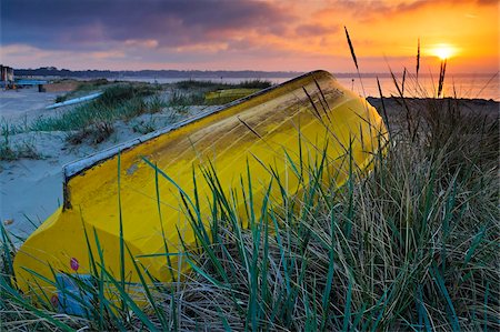 sand dunes at sunset - Upturned boat among the sand dunes at Mudeford Spit, Dorset, England, United Kingdom, Europe Stock Photo - Rights-Managed, Code: 841-05962009