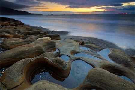 simsearch:841-05959794,k - Spectaculaires formations de grès et de coucher du soleil sur Seven Mile Beach, près de Greymouth, île du Sud, Nouvelle-Zélande, Pacific Photographie de stock - Rights-Managed, Code: 841-05962168