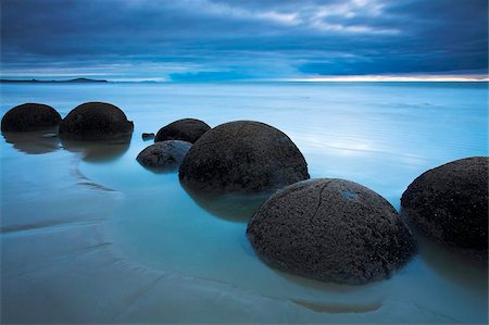 simsearch:841-05962191,k - The unusual circular Moeraki boulders along the Otago Coast, Otago, South Island, New Zealand, Pacific Foto de stock - Con derechos protegidos, Código: 841-05962203