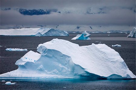 simsearch:841-07080930,k - Magnificent icebergs in a cloud filled Antarctic Peninsula, Antarctica, Polar Regions Stock Photo - Rights-Managed, Code: 841-05962305