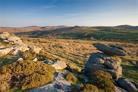 Granite outcrops in Dartmoor National Park, looking across to Hound Tor and Hay Tor on the horizon, Devon, England, United Kingdom, Europe Stock Photo - Rights-Managed, Code: 841-05962556