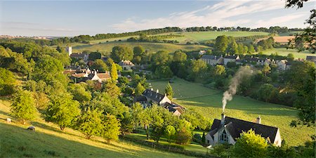 england town not people not london not scotland not wales not northern ireland not ireland - Cottages nestled into the valley in the picturesque Cotswolds village of Naunton, Gloucestershire, England, United Kingdom, Europe Foto de stock - Con derechos protegidos, Código: 841-05962626