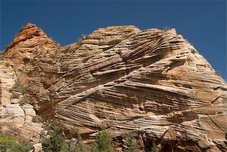 sandstone - Cross-bedded sandstone formations (ancient sand dunes), seen from the Zion to Mount Carmel Highway, Zion National Park, Utah, United States of America, North America Stock Photo - Rights-Managed, Code: 841-05962730