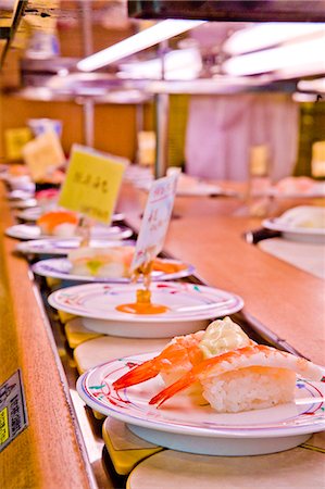 sushi plate - Kaiten-zushi shop (sushi restaurant), Shinjuku, Tokyo, Japan, Asia Stock Photo - Rights-Managed, Code: 841-06034044