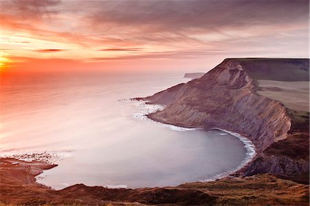 dorset - A beautiful sunset over Chapman's Pool on Dorset's Jurassic Coast, UNESCO World Heritage Site, Dorset, England, United Kingdom, Europe Foto de stock - Con derechos protegidos, Código: 841-06034404