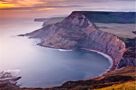 dorset - A beautiful sunset over Chapman's Pool on Dorset's Jurassic Coast, UNESCO World Heritage Site, Dorset, England, United Kingdom, Europe Foto de stock - Con derechos protegidos, Código: 841-06034405