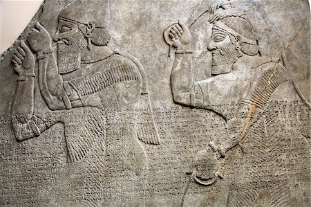 exhibit museum art - Tablet depicting Assyrian tribute bearers, British Museum, London, England, United Kingdom, Europe Stock Photo - Rights-Managed, Code: 841-06030331