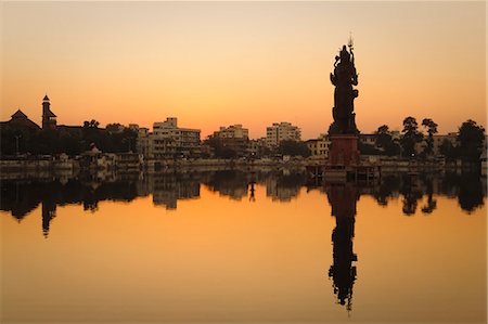 Statue of Shiva rising out of a Lake Sur Sagar in the centre of Vadodara, Gujarat, India, Asia Stock Photo - Rights-Managed, Code: 841-06030839