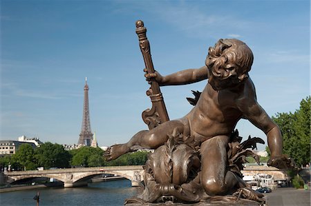 Statue on the Alexandre III Bridge, River Seine and the Eiffel Tower, Paris, France, Europe Stock Photo - Rights-Managed, Code: 841-06030874