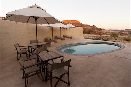 pool chairs - Damaraland Camp, Huab River Valley, Torra Conservancy, Damaraland, Namibia, Africa Stock Photo - Rights-Managed, Code: 841-06030885